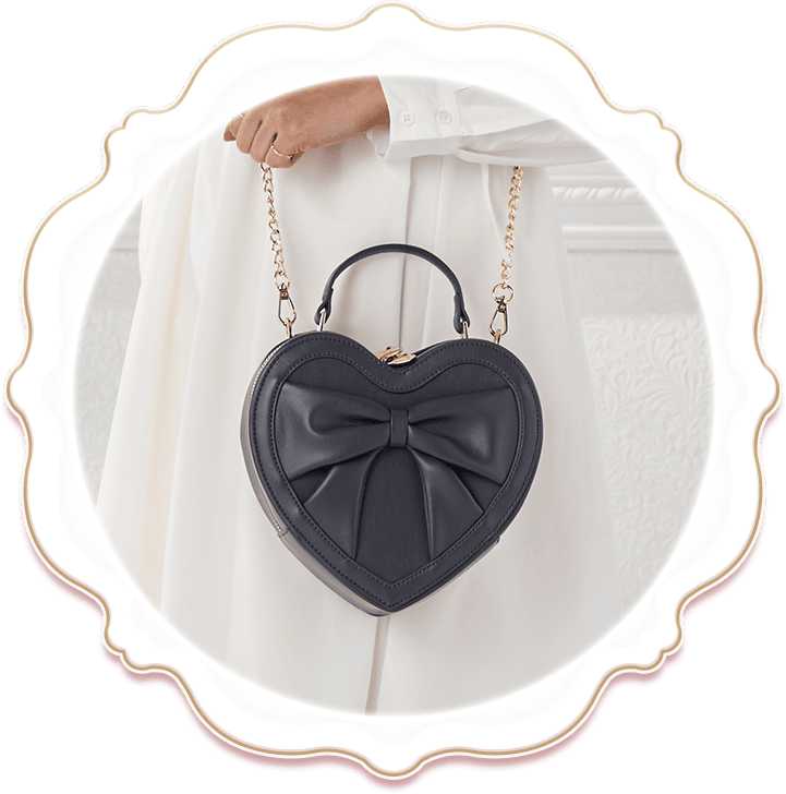 ハートのフォルムとぷっくりリボンが愛らしい♡